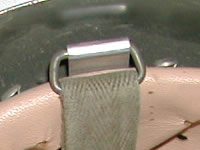Trapezium-shaped chinstrap ring